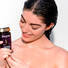 Kerastase Chronologiste Bain Regenerant Shampoo product in hand
