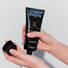 Kerastase Chronologiste Pre-Cleanse Regenerant Hair Scrub product in hand